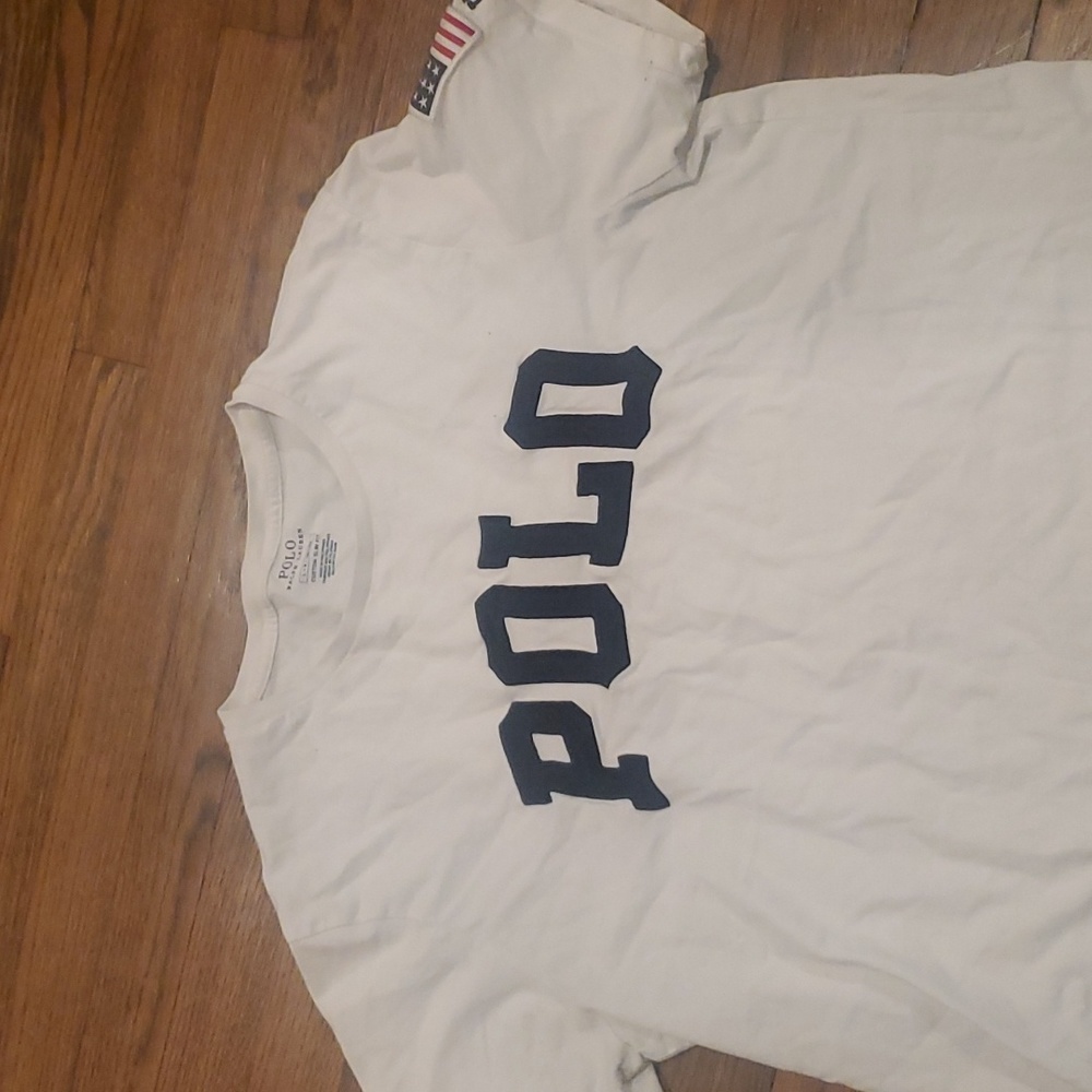 Adult LG slim fit Polo.. runs small..prob more like Adult small...neck is worn